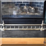 D23. Fireplace fender. 